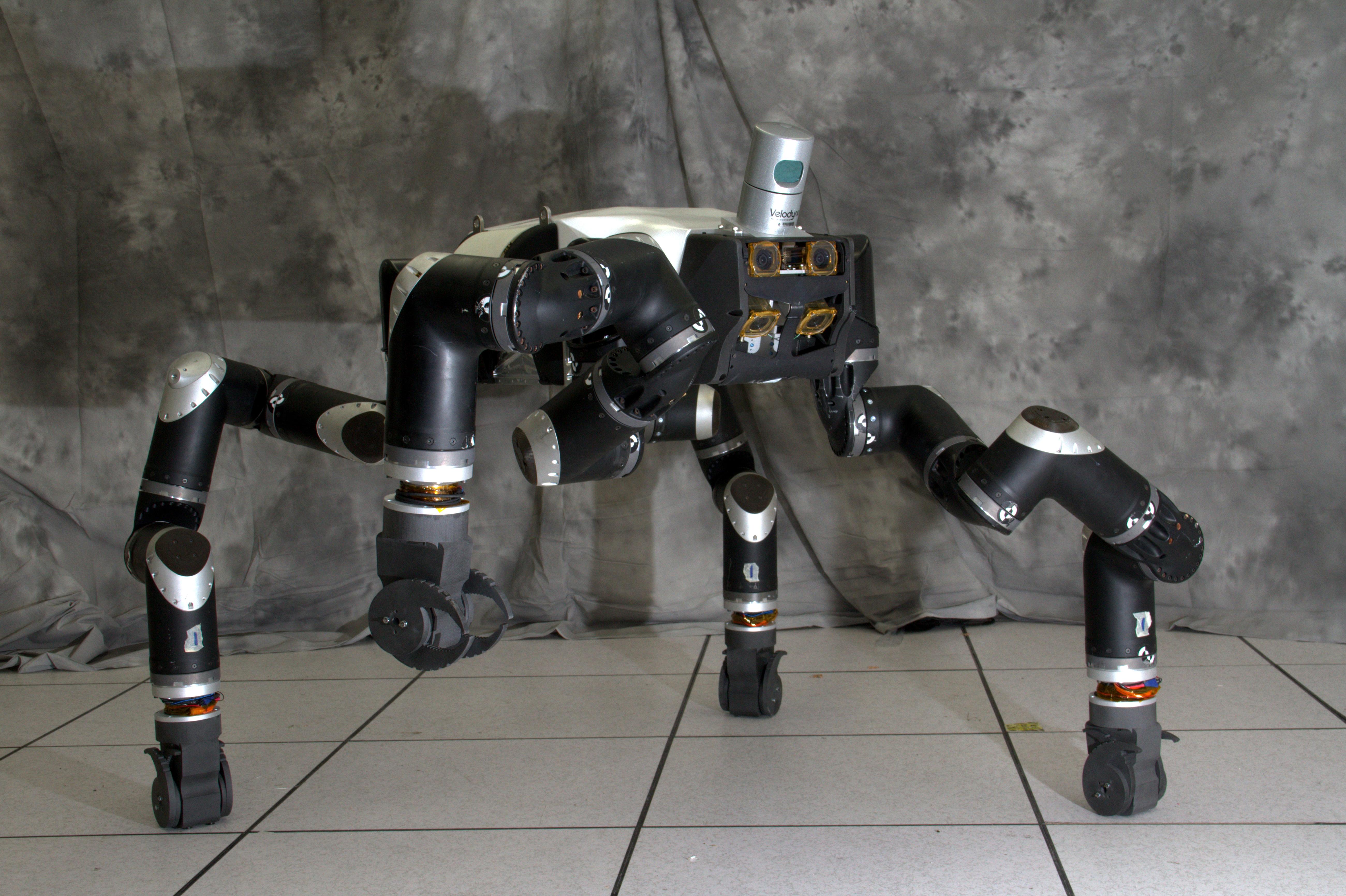 Figure 3.3: RoboSimian is an ape-like robot that moves around on four limbs. It was designed and built at NASA’s Jet Propulsion Laboratory in Pasadena, California. It competed in the 2015 DARPA Robotics Challenge Finals. 